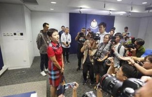 新华社记者采访遭暴力事件，报社的坚定回应