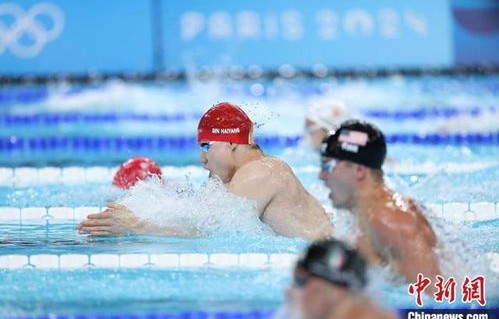 覃海洋闪耀赛场，勇夺男子100米蛙泳金牌