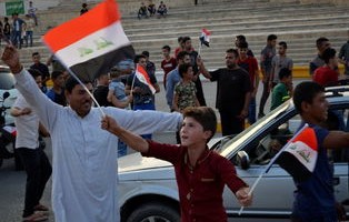 伊拉克街头意外发现株洲二中校服，跨越千里的文化交流见证